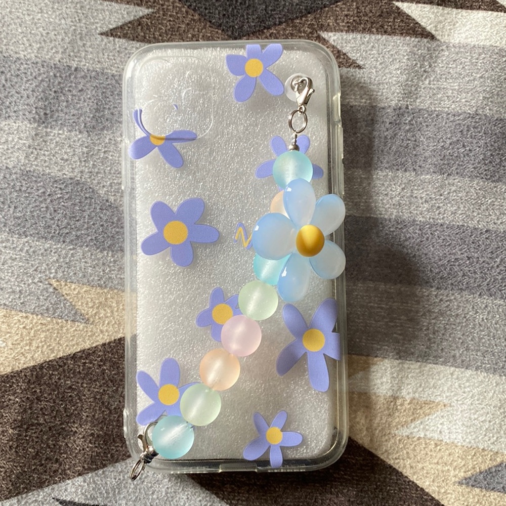 Phone case with bead hand holder